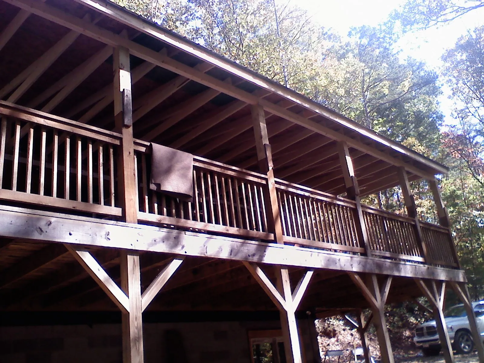 Timber framing under a new elevated porch and deck — Roof Leak Repair in Union Grove by Roofing Brothers